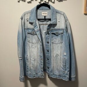 Distressed oversized jean jacket size 1XL.